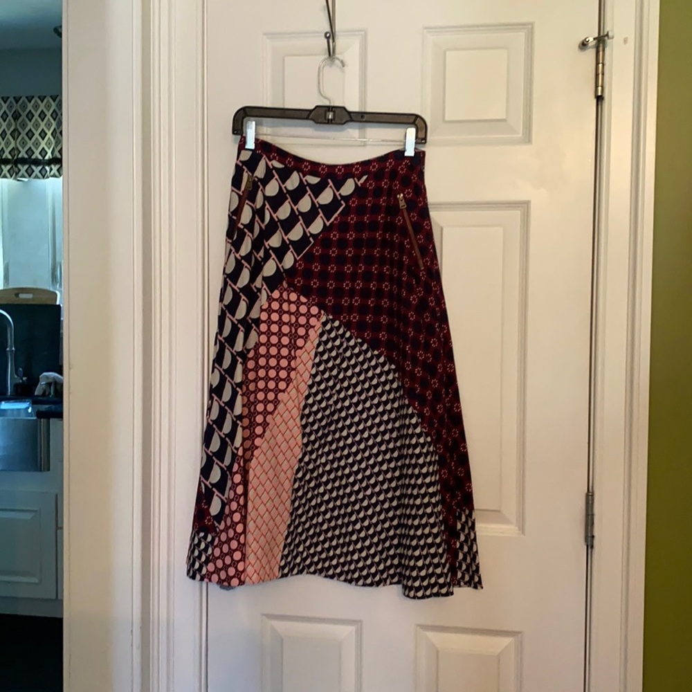 Multi-patterned midi skirt.